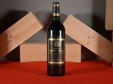 a bottle of wine that is sitting on a table