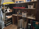 a room that has a lot of boxes and boxes on the shelves