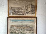 two framed pictures of a view of a city and a picture of a castle