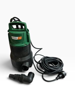 a green and black submerst with a cord attached to it