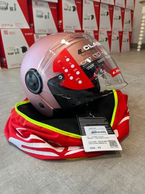 a helmet that is sitting on top of a bag