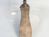 a small metal object that is sitting on a table