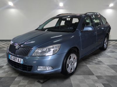 a picture of a blue car parked in a garage