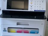 a printer that is sitting on top of a table