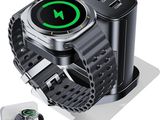 a smart watch sitting on a stand with a charger