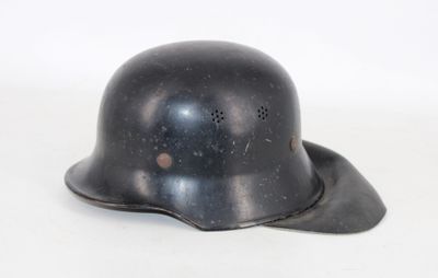 a helmet that is sitting on a white surface