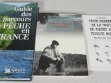 two books are sitting on a table next to each other