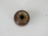 an image of a brown vase on a white surface