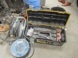 a tool box with tools in it on the floor