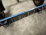 an image of a trailer with a motorcycle attached to it