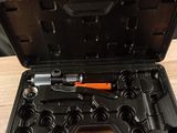 a tool set in a case on a table