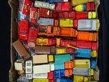 a box full of assorted toy cars in it