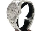 rolex watch on a wooden stand on a white background