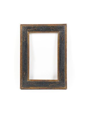 an old picture frame on a white wall with a white background