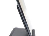 a cell phone that is sitting on a stand