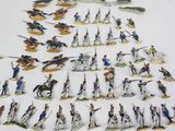 a lot of figurines that are on a table