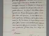 an old handwritten letter on a piece of paper with writing on it