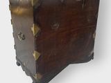 an old wooden chest with a metal handle on a white background
