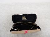 a pair of sunglasses sitting in a case on a table