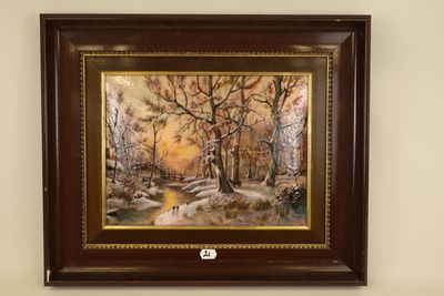 framed oil painting of a winter scene by a stream in a wooded setting