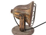 a wooden lamp that is on top of a metal stand