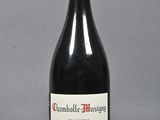 a bottle of wine that is sitting on a table