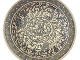 an image of a decorative plate with a design on it