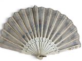 a white fan that is sitting on a white surface