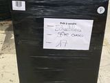 a black box with a sign on it sitting on a pallet