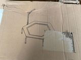a cardboard box with a drawing of a chair on it