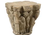 a stone pedestal with a statue on top of it