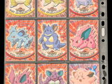 pokemon trading cards are displayed in a binder on a black background