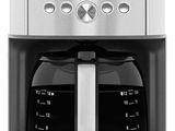 a close up of a coffee maker on a white background