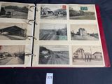 a book with pictures of trains on it on a table