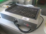 a grill that is sitting on top of a table