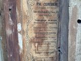 a plaque on the side of a building that says ph cerisier