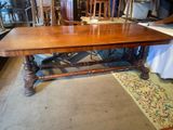 a large wooden table with many chairs around it