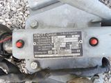 a close up of a motor that is on the ground