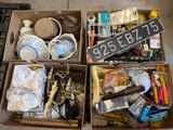 two boxes of assorted items sitting on the floor