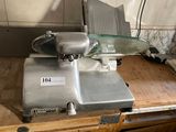 a machine that is sitting on top of a wooden table