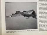 an old photo of a plane flying in the sky