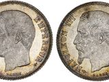 two silver sovereigns, one of which has a profile of a man and the other of which is a