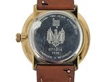an image of a wrist watch with a coin on the face