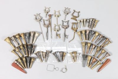 a lot of different tools that are on a white surface