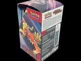 the box is open to show the inside of the pokemon trading card game