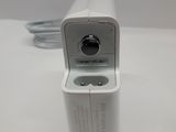 an image of a small white device on a white surface