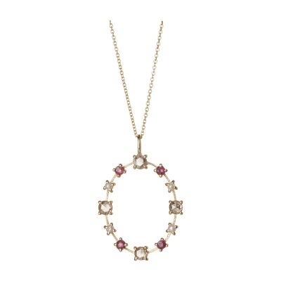 un collier en or orné de diamants roses et blancs montés sur une chaîne