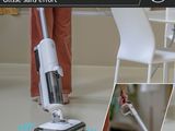 an image of a person using a steam mop to clean a floor