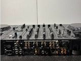 a picture of a dj mixer in a recording studio
