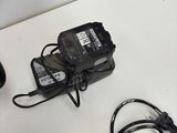 a corded driller and a corded corded cord on a table